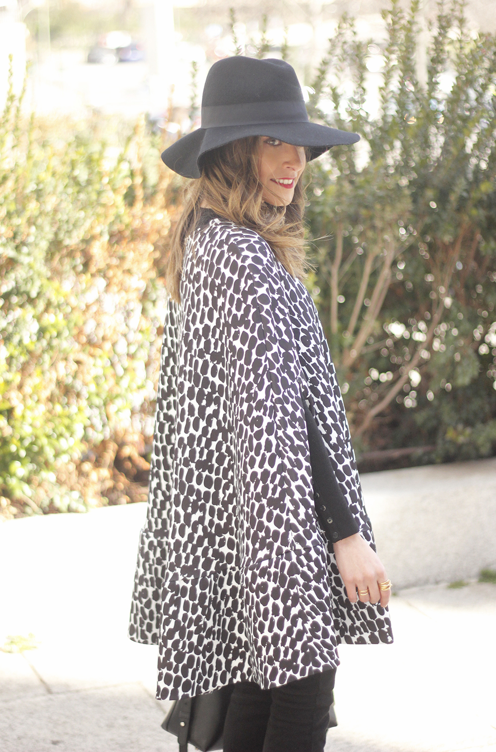 black and white outfit cape dress over the knee boots furla handbag style02