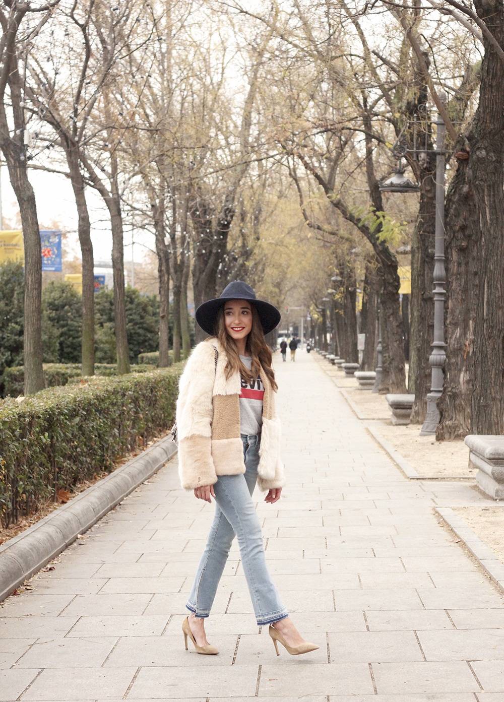 Beige faux fur coat zara blue hat nude heels jeans style fashion outfit winter 08