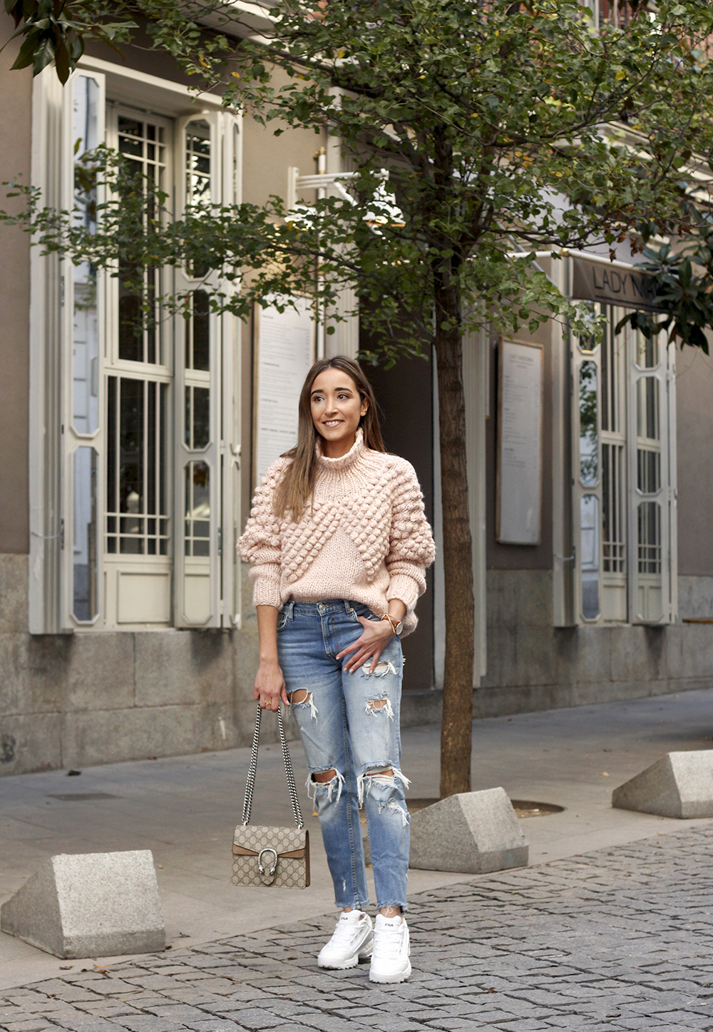 chunky pink sweater ripped jeans white fila sneakers gucci bag street style fall outfit 20184326
