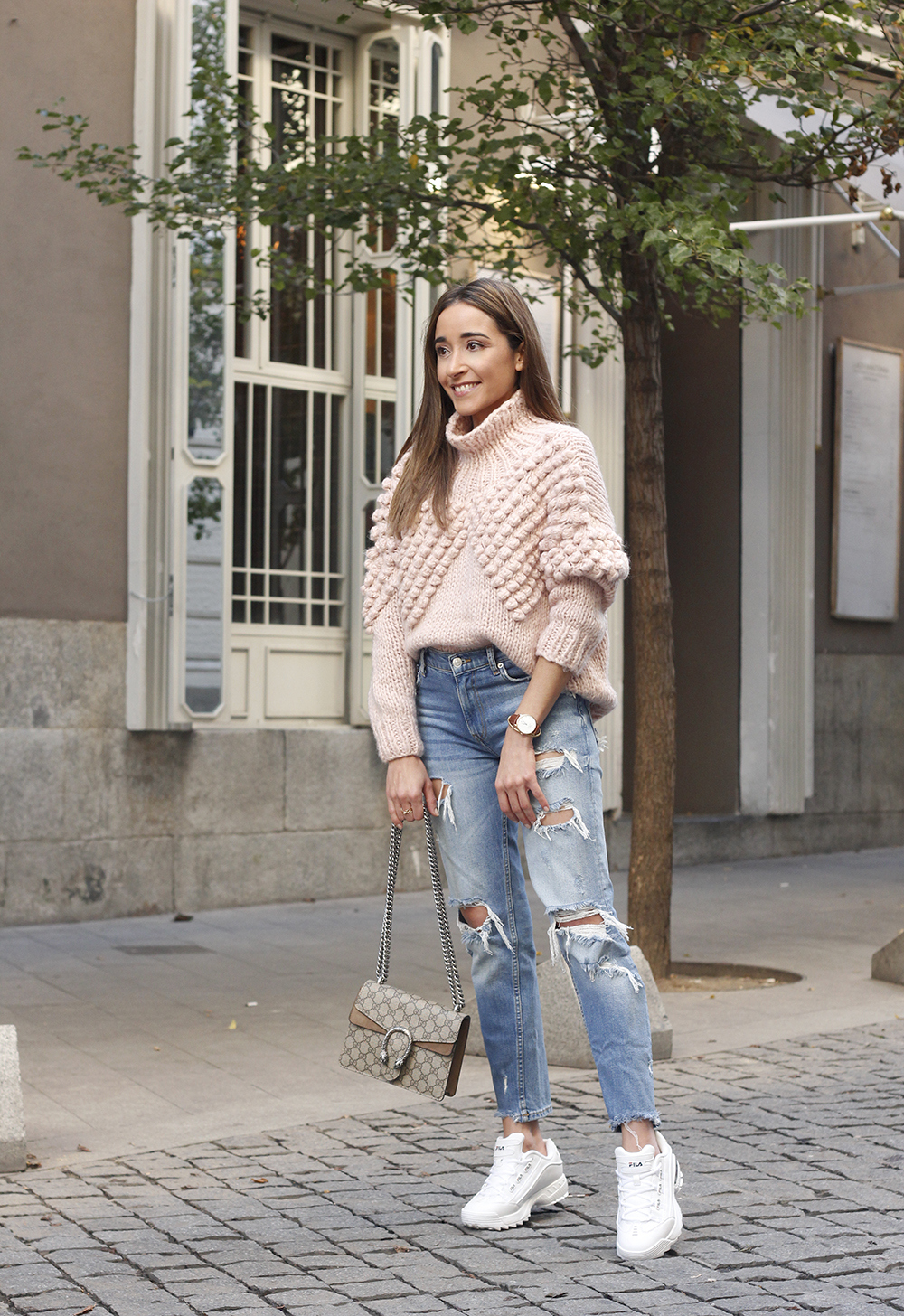 chunky pink sweater ripped jeans white fila sneakers gucci bag street style fall outfit 20184698