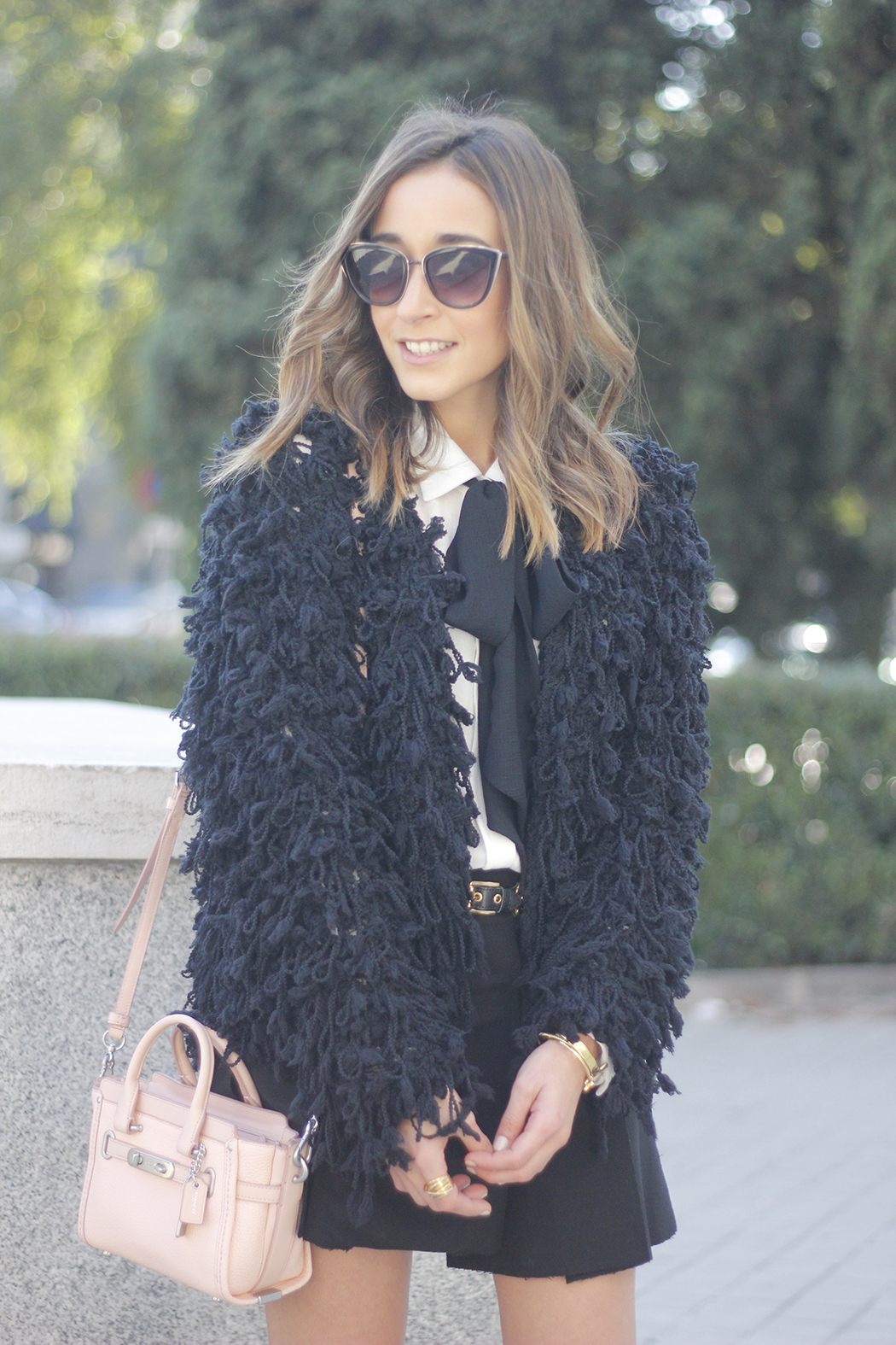 black jacket shirt with black bow coach pink bag heels outfit09