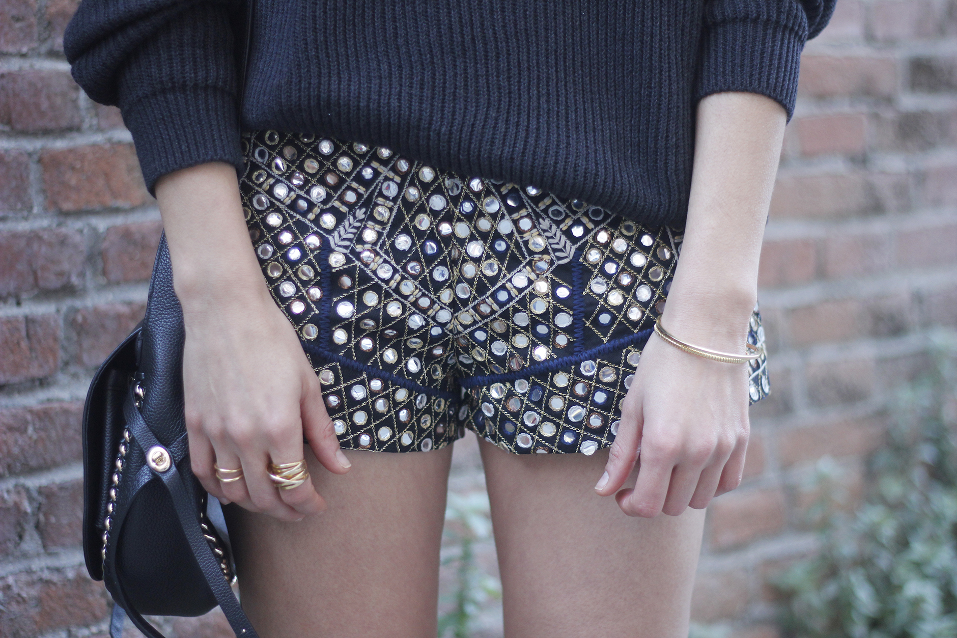 embroidered shorts black hat over the knee boots black sweater pull and bear purse coach outfit12