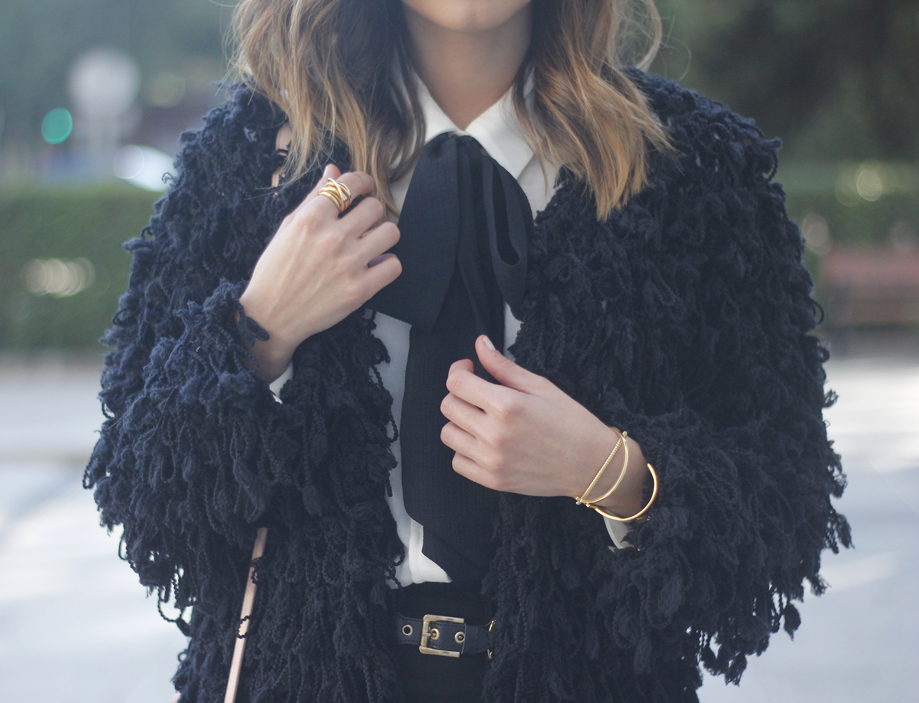 black jacket shirt with black bow coach pink bag heels outfit12