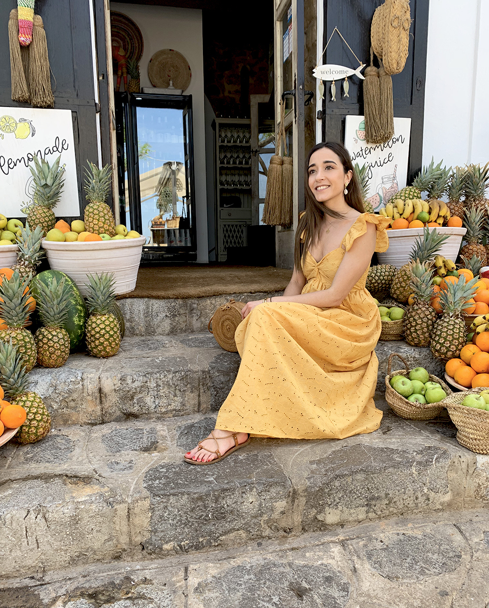mustard embroidered midi dress straw bag street style outfit 2019 vacation ibiza14