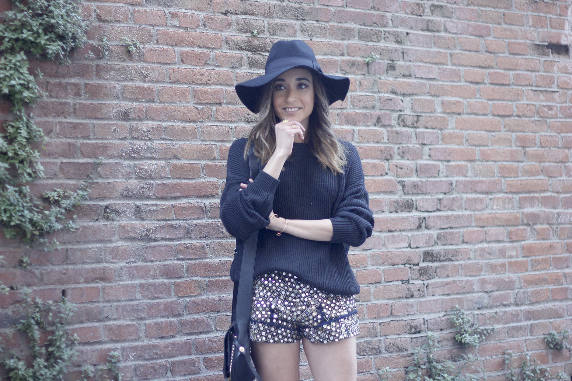 embroidered shorts black hat over the knee boots black sweater pull and bear purse coach outfit09