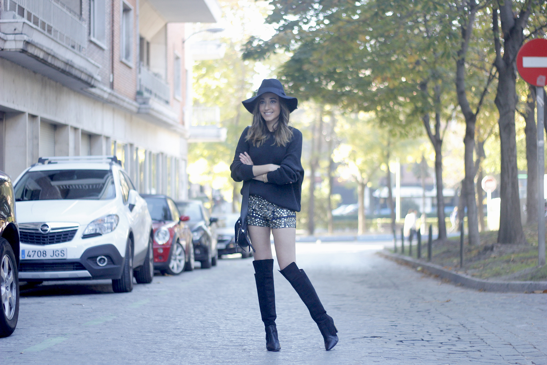 embroidered shorts black hat over the knee boots black sweater pull and bear purse coach outfit03