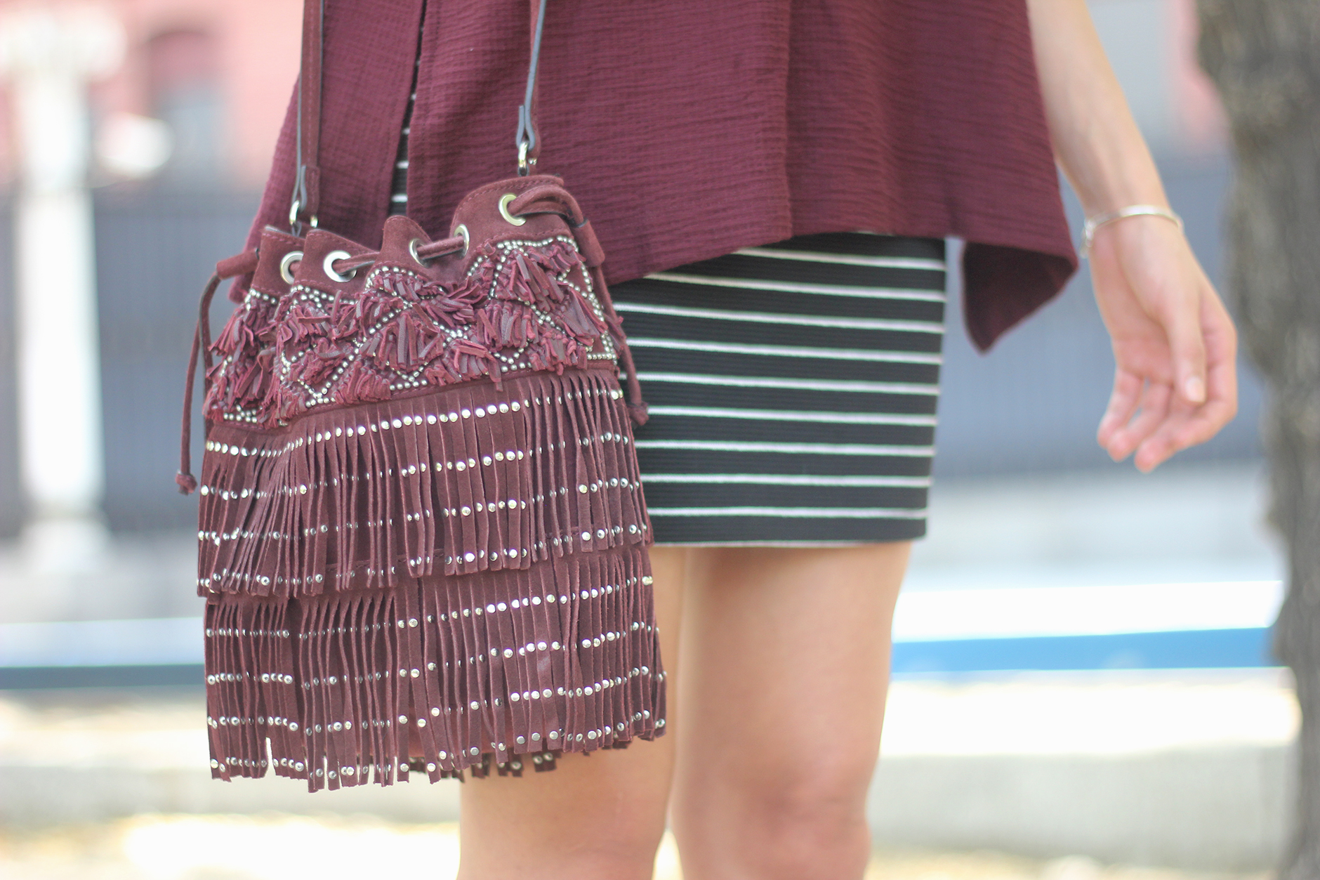 Striped Skirt With Burgundy T-shirt And Fringed Bag Summer Outfit24