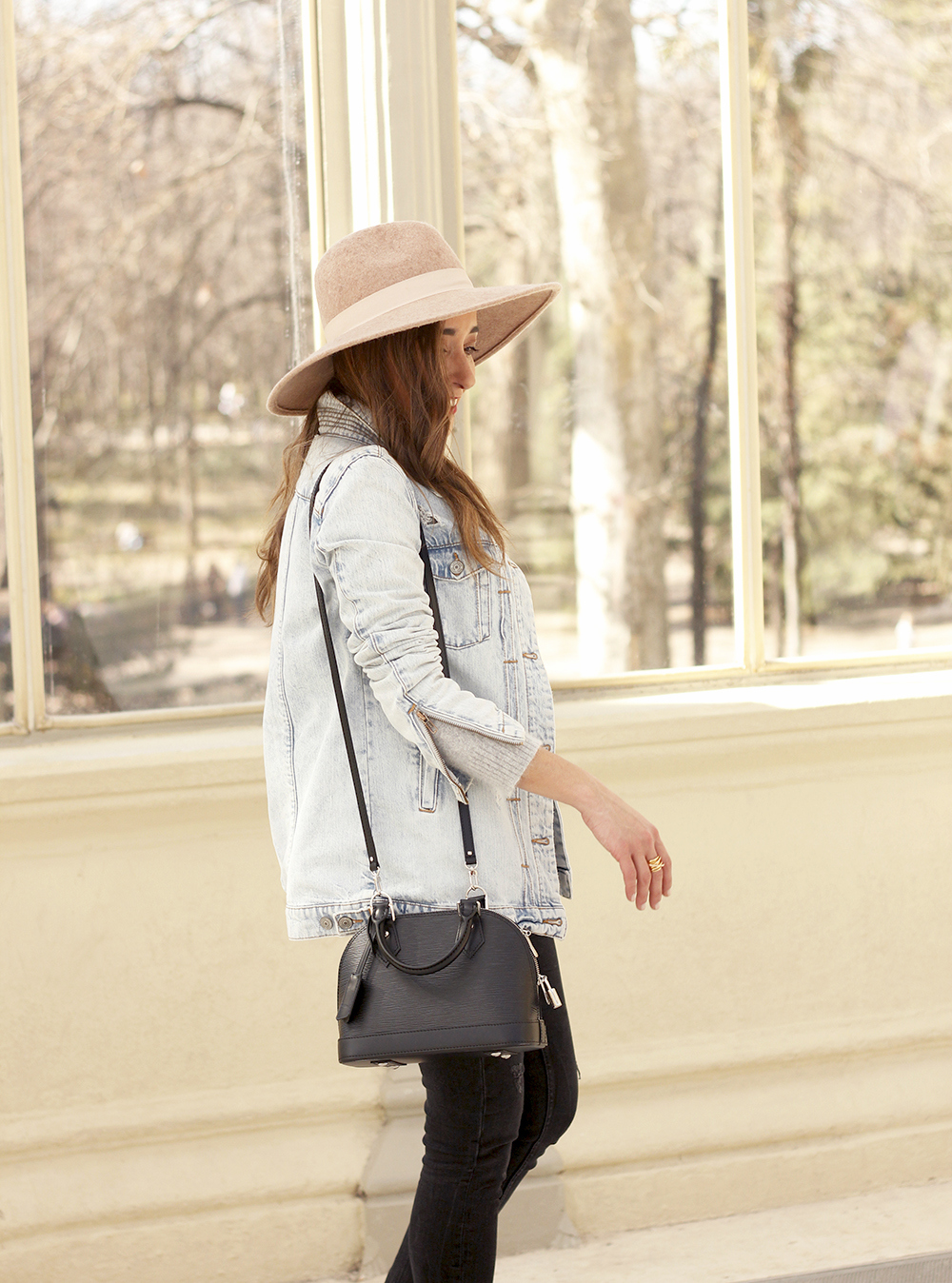 Denim jacket black jeans carolina herrera bag louis vuitton hat street style outfit 20192