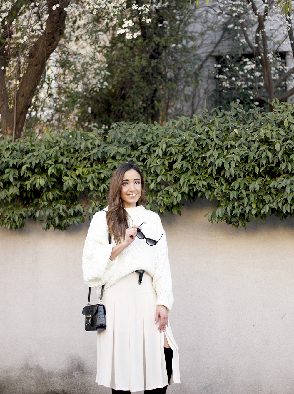 pink pale midi skirt white sweater black boots givenchy bag street style outfit 201914