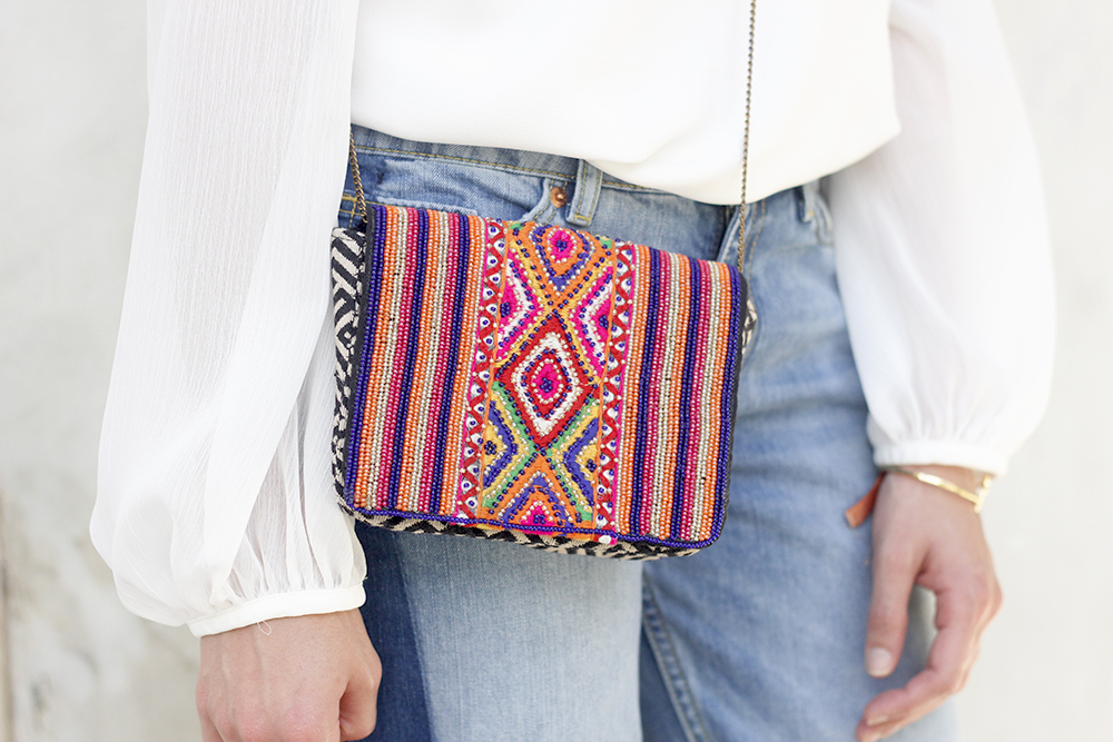 Boyfriend Jeans With Asymmetrical Hems white blouse carolina herrera heels daydaday bag outfit style streetstyle20