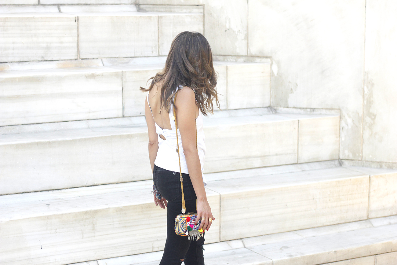 Knotted top black ripped jeans heels clutch sunnies summer outfit06