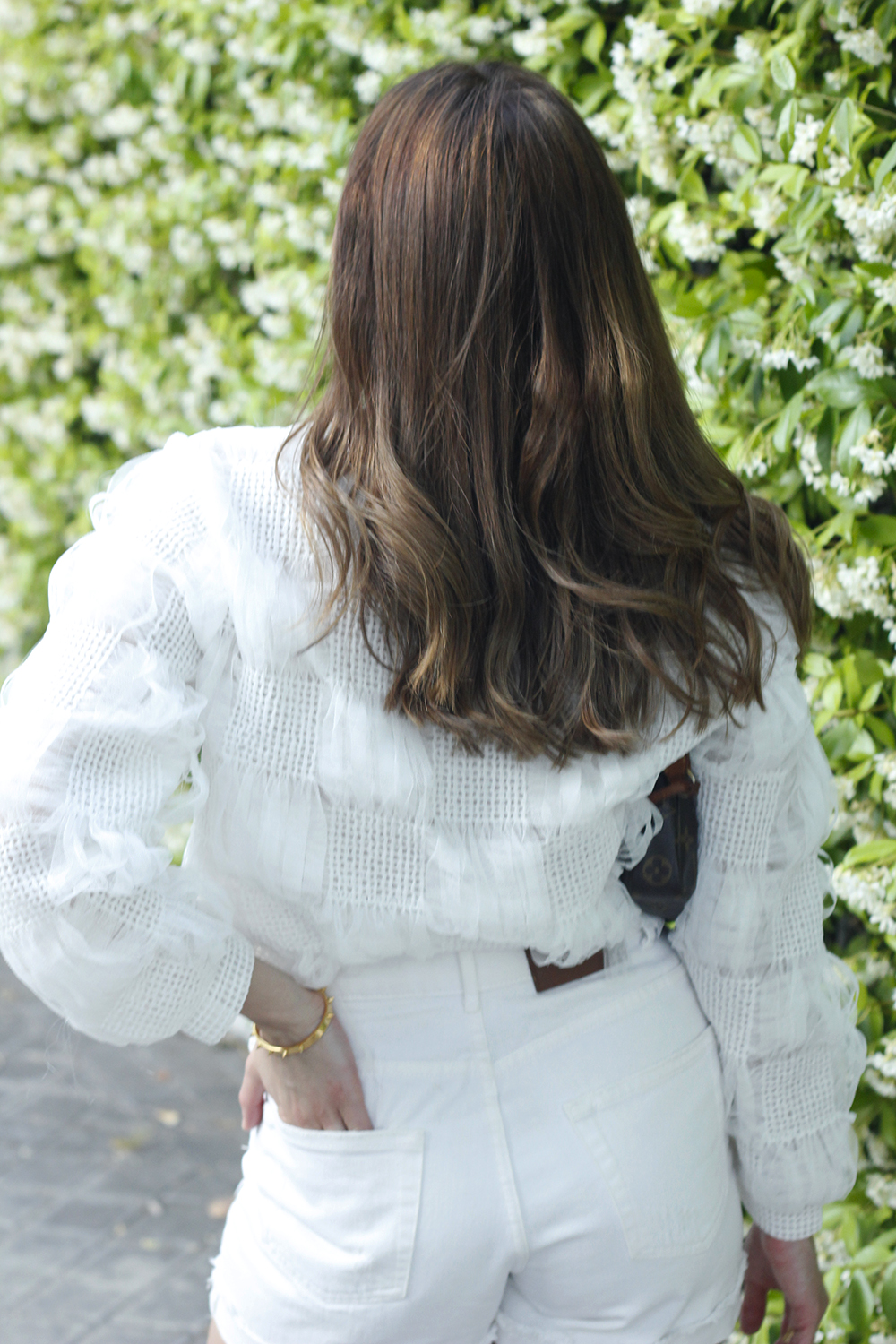 white shorts white sweater black shoes louis vuitton bag street style 20207