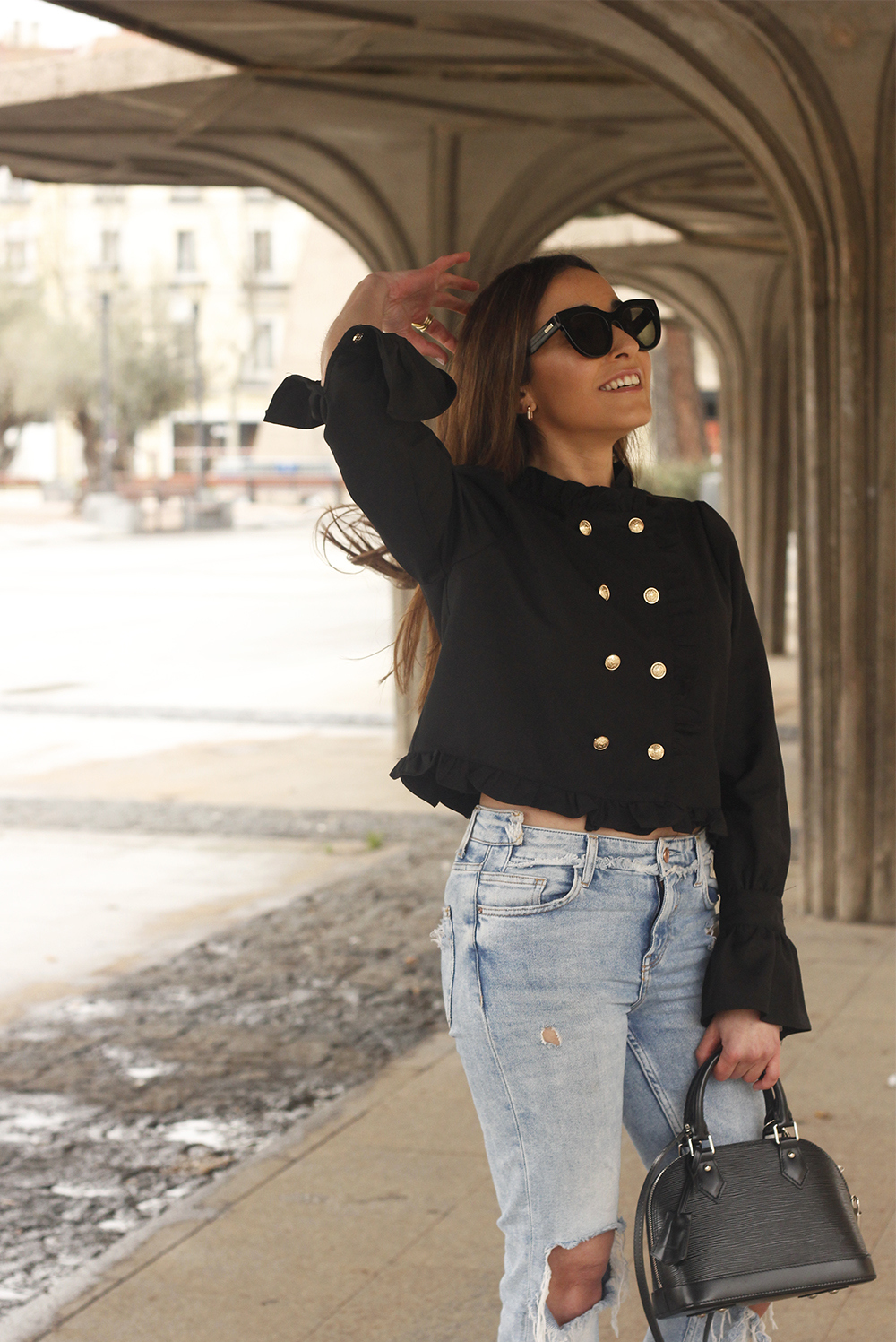 black blouse jeans louis vuitton street style outfit5